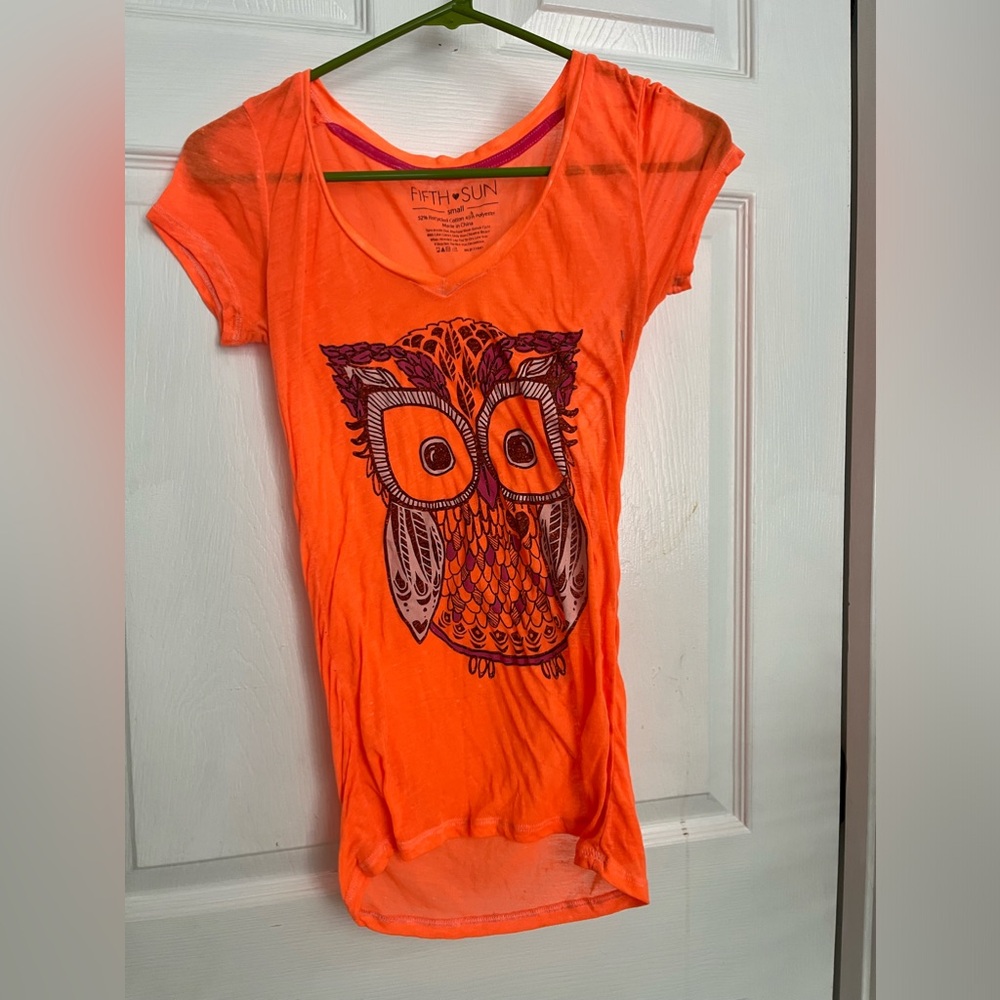 Tee shirt. Bright orange with owl print.